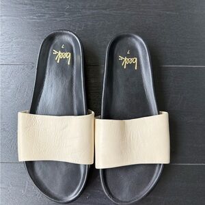 Beek Black and Tan Slide Sandals